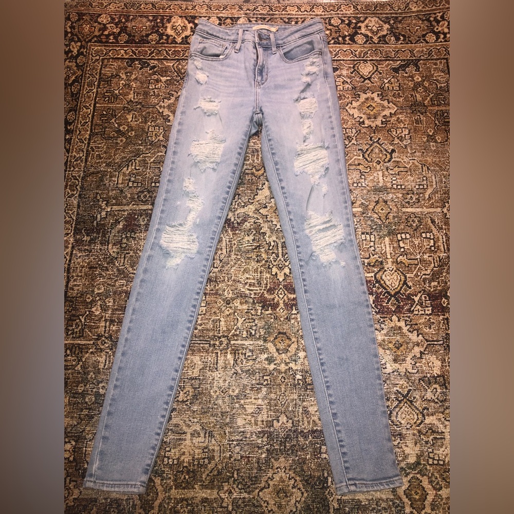 721 Levi High Rise Distressed Skinny Jeans